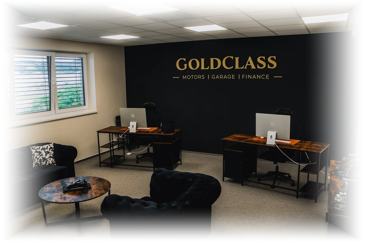 The GoldClass office, with the GoldClass Motors, Garage and Finance logo on the wall.